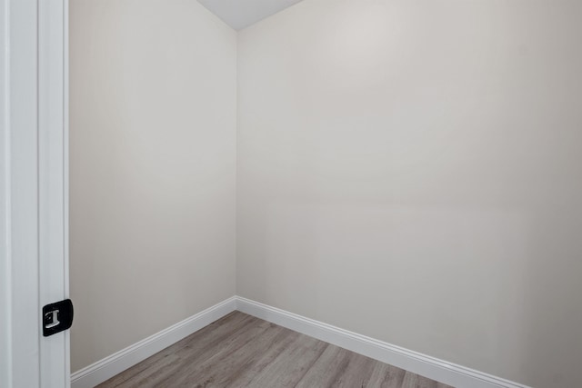 unfurnished room featuring light hardwood / wood-style floors