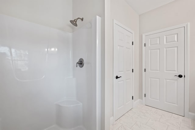 bathroom featuring a shower