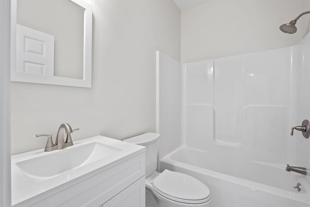 full bathroom with vanity,  shower combination, and toilet