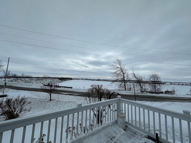 view of snow covered deck