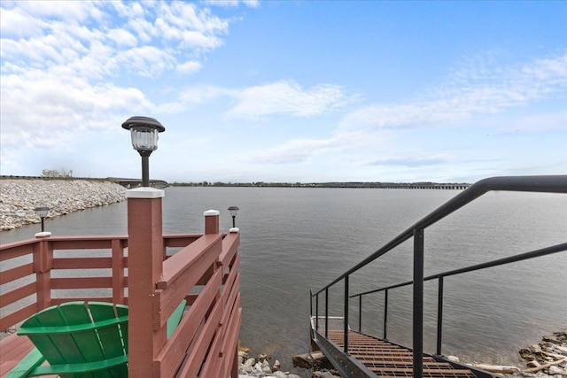 view of dock with a water view