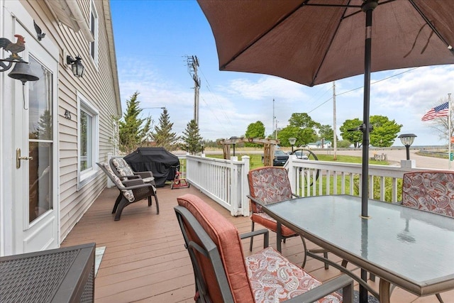 wooden terrace with grilling area