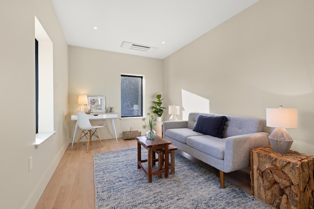 living room featuring light wood-type flooring