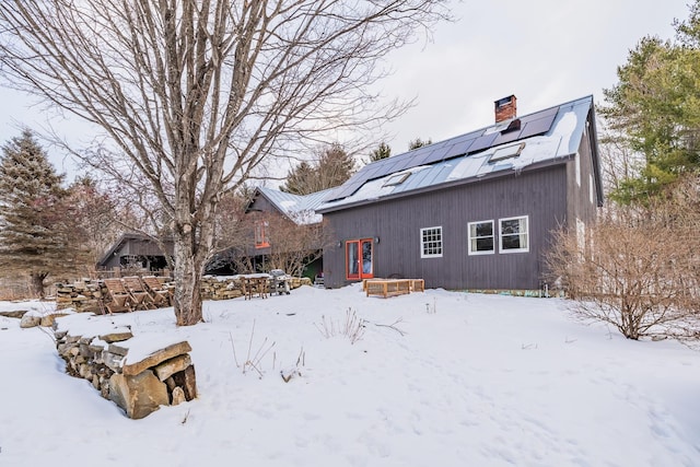 view of snow covered property