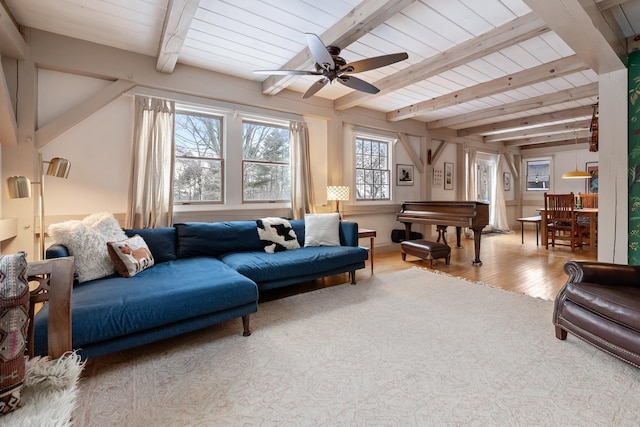 living room with beamed ceiling, pool table, ceiling fan, wood ceiling, and light wood-type flooring