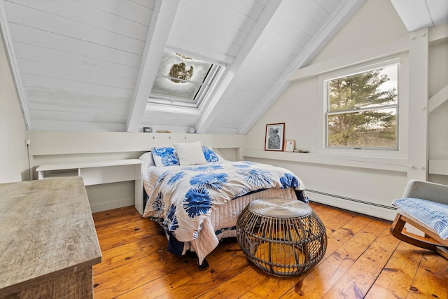 bedroom with baseboard heating, light hardwood / wood-style floors, and vaulted ceiling with beams