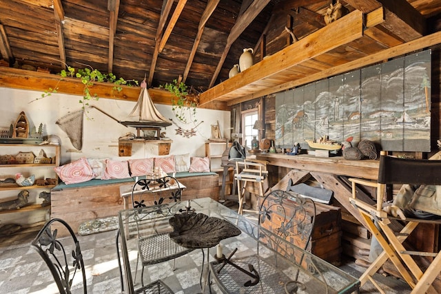 misc room featuring lofted ceiling with beams and wooden ceiling