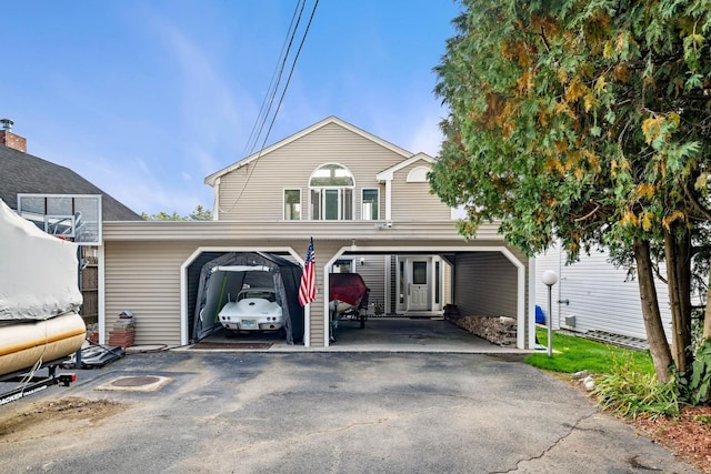 view of front property with a carport