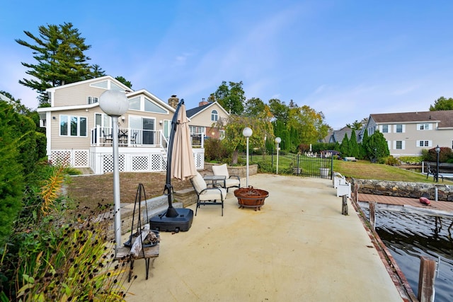 view of patio / terrace with a fire pit