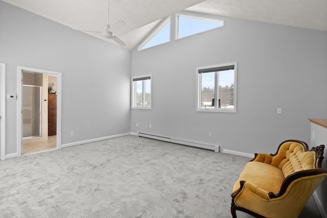 unfurnished room featuring ceiling fan, a baseboard radiator, high vaulted ceiling, and light carpet