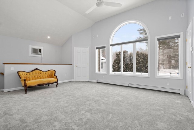 sitting room with baseboard heating, ceiling fan, high vaulted ceiling, and carpet