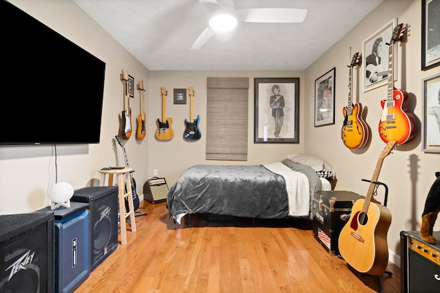 bedroom featuring light hardwood / wood-style flooring and ceiling fan