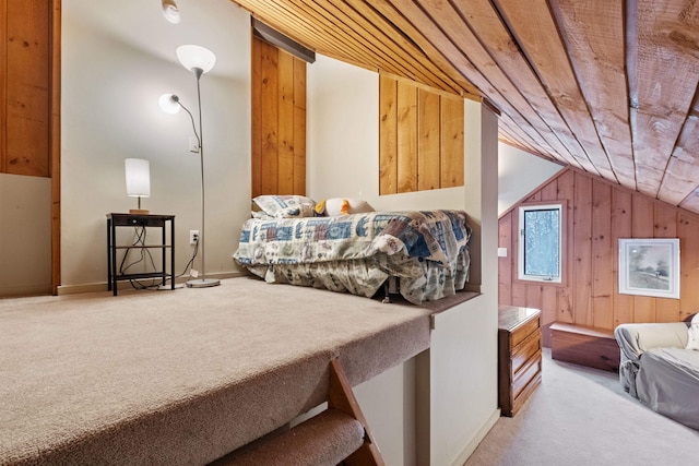 bedroom with light carpet, lofted ceiling, and wood walls