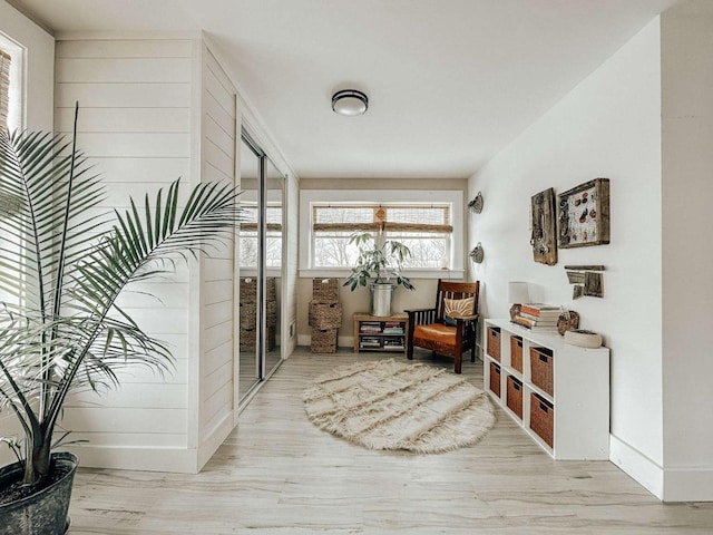 living area with light hardwood / wood-style floors