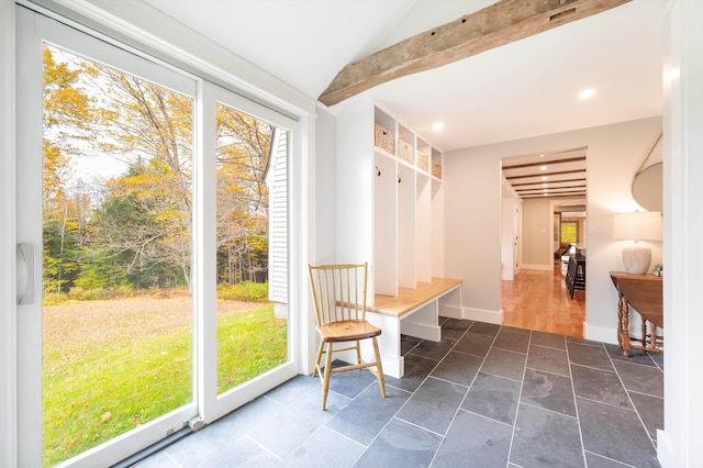 mudroom featuring beamed ceiling