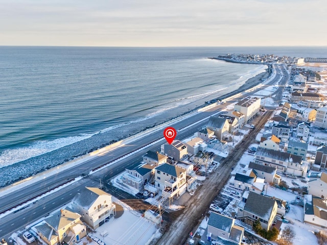 bird's eye view featuring a beach view and a water view