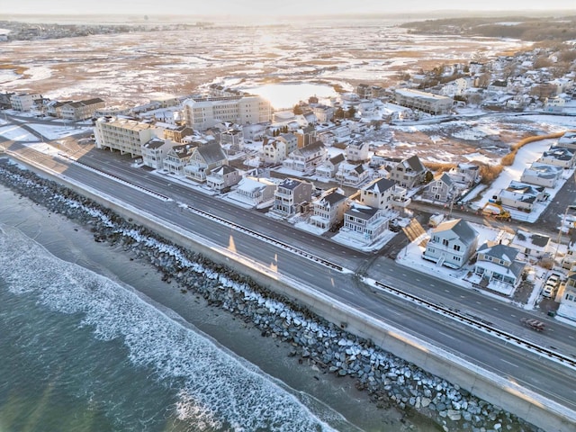 aerial view featuring a water view and a view of the beach