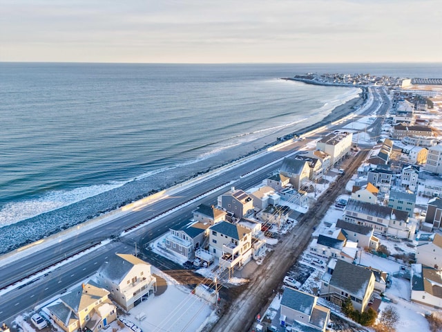 bird's eye view with a view of the beach and a water view