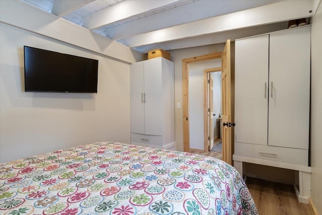 bedroom with light wood-type flooring