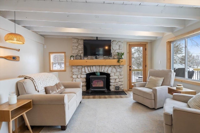 living room featuring light hardwood / wood-style flooring and beamed ceiling