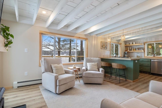 living room featuring baseboard heating, indoor bar, beam ceiling, and hardwood / wood-style floors