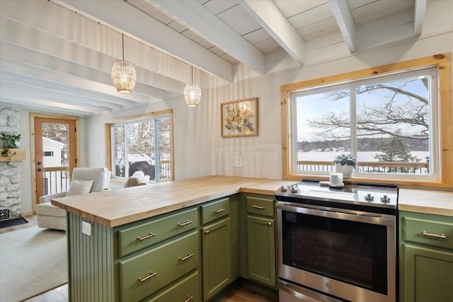 kitchen with butcher block counters, stainless steel electric range oven, decorative light fixtures, green cabinets, and beam ceiling