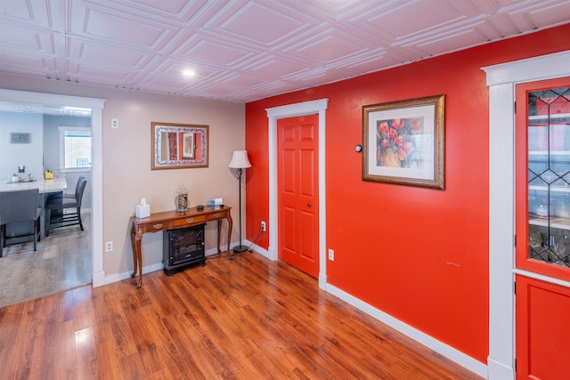 entryway with hardwood / wood-style flooring