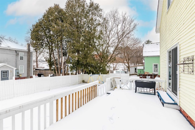 view of snow covered deck