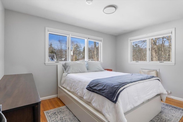 bedroom featuring light wood-type flooring