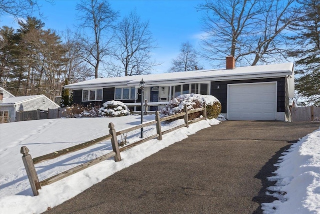 ranch-style house with a garage