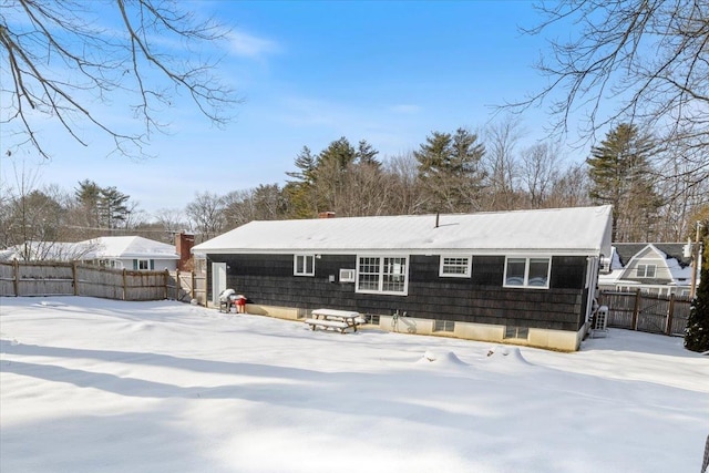 view of snow covered property