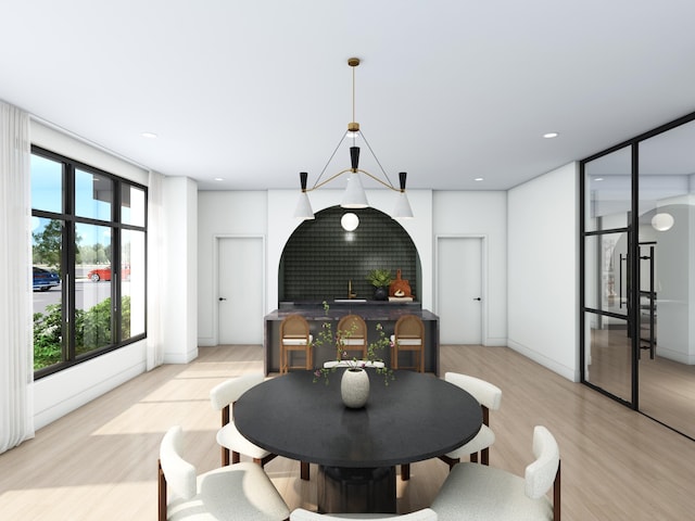 dining space featuring light hardwood / wood-style floors