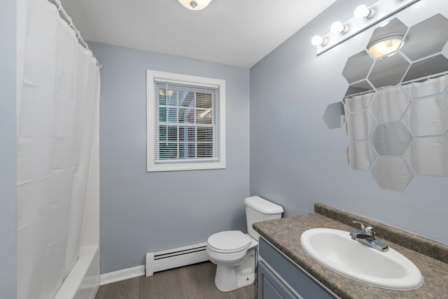 full bathroom featuring shower / tub combo, vanity, wood-type flooring, a baseboard radiator, and toilet