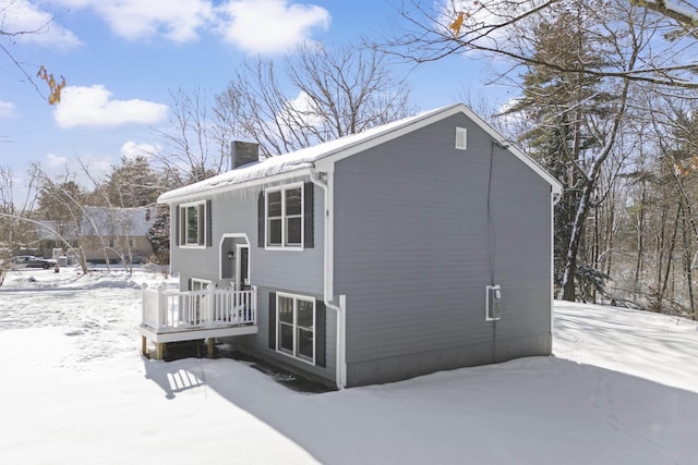 view of snow covered property