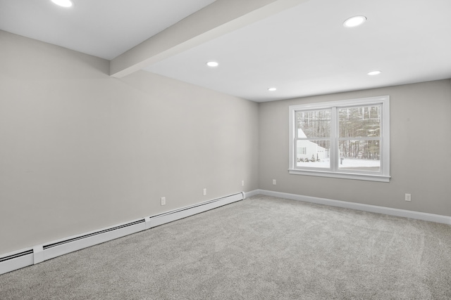 carpeted empty room featuring beam ceiling and baseboard heating