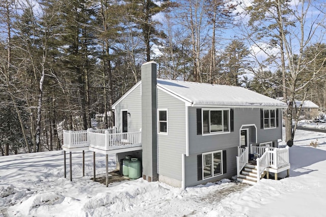 view of snow covered house