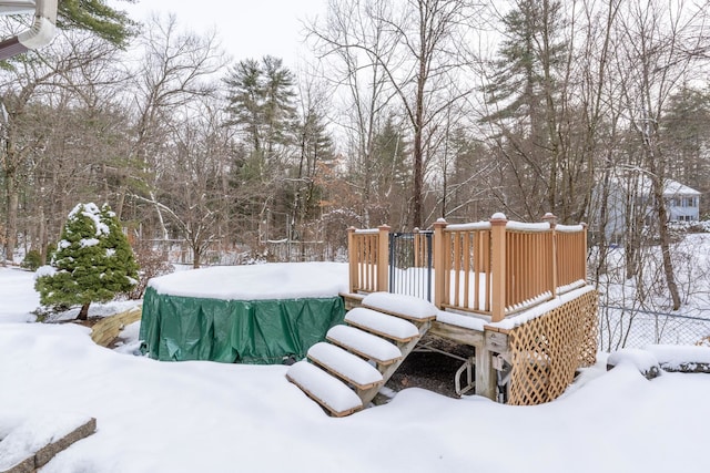 view of snow covered deck