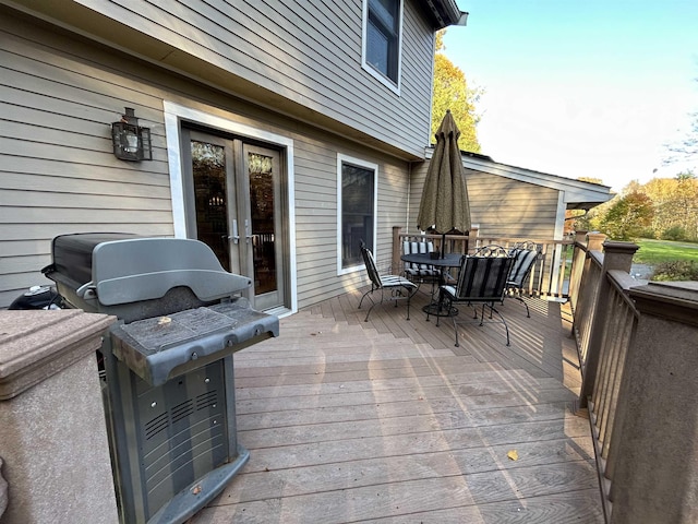 wooden deck with area for grilling