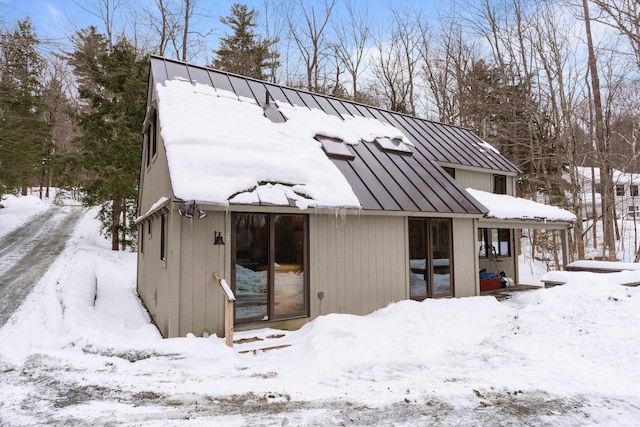 view of snow covered property