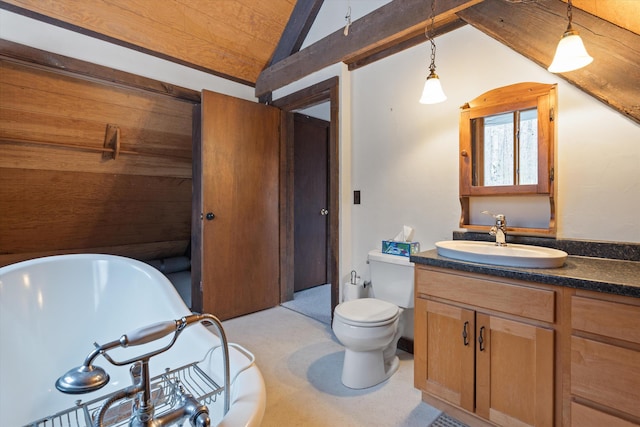 bathroom with lofted ceiling, toilet, a bathing tub, and vanity