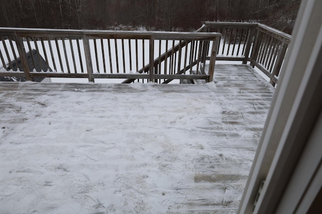 view of snow covered deck