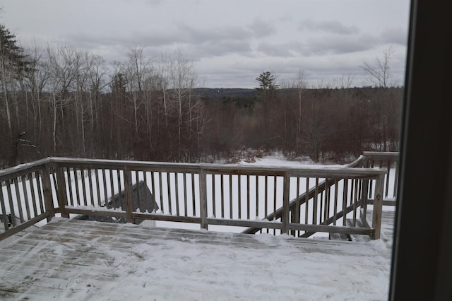 view of snow covered deck