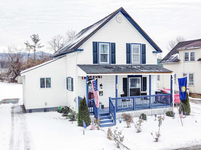 view of property featuring a porch