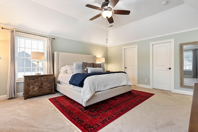 carpeted bedroom featuring ceiling fan and lofted ceiling