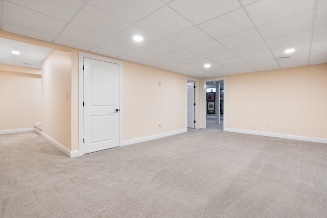 basement with light colored carpet