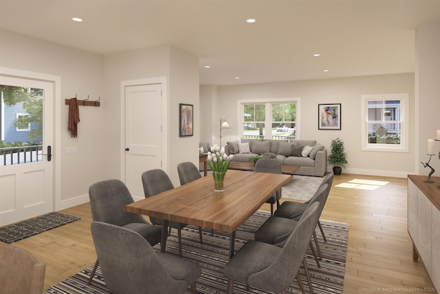 dining space featuring light wood-type flooring