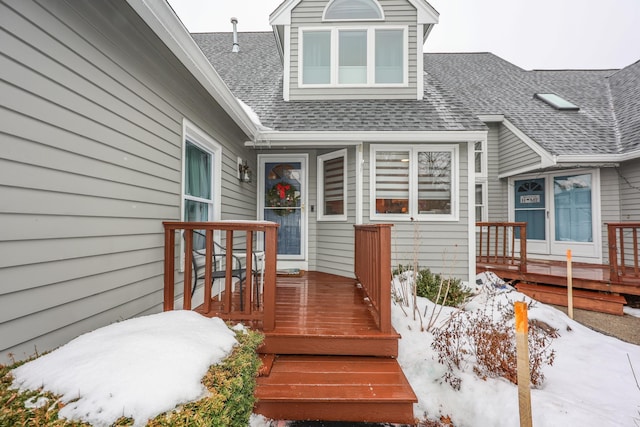 view of snow covered deck