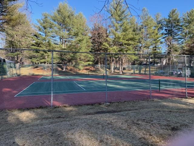 359 Winding Pond Rd Unit 359, Londonderry, NH 03053 - view of tennis court featuring fence