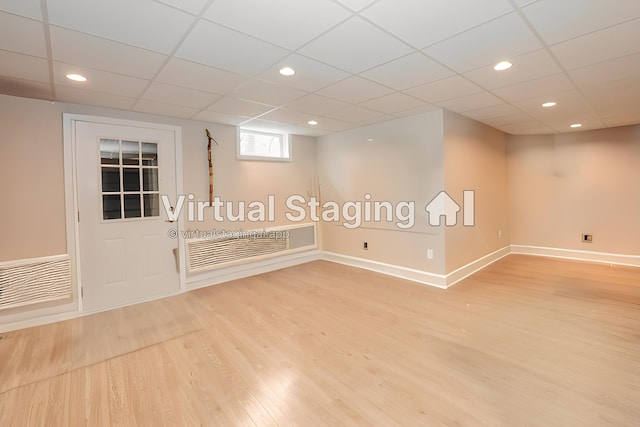 359 Winding Pond Rd Unit 359, Londonderry, NH 03053 - basement with light wood-style floors, baseboards, and visible vents