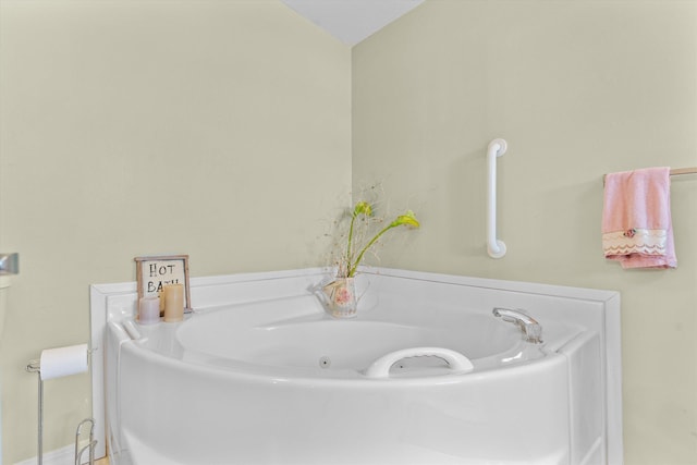 bathroom with a washtub